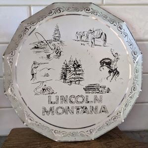 Vintage Lincoln, Montana aluminium round platter